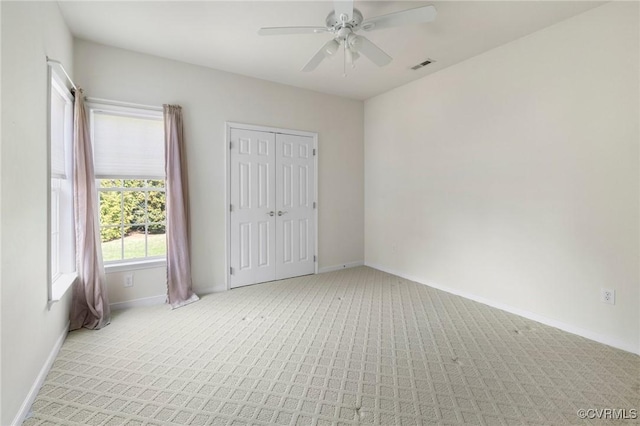 9401 Nolandwood Dr, Mechanicsville, VA 23116 - unfurnished bedroom with light carpet, baseboards, and a closet