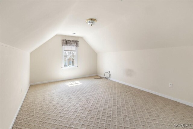 9401 Nolandwood Dr, Mechanicsville, VA 23116 - bonus room featuring light colored carpet, vaulted ceiling, and baseboards