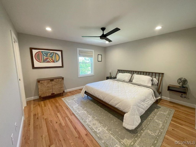 1710 N 29th St, Richmond, VA 23223 - bedroom with light wood finished floors, baseboards, recessed lighting, and a ceiling fan