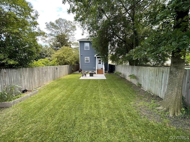 1710 N 29th St, Richmond, VA 23223 - view of yard with a patio