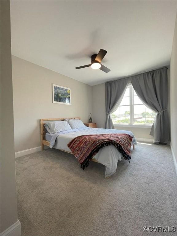 1710 N 29th St, Richmond, VA 23223 - carpeted bedroom with baseboards and ceiling fan