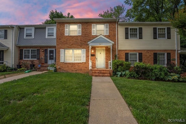 2911 Ennismore Ct, Chesterfield, VA 23224 - townhome / multi-family property featuring brick siding and a front lawn