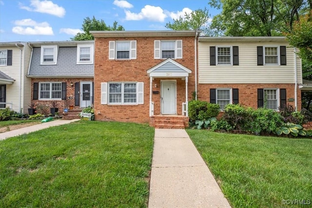 2911 Ennismore Ct, Chesterfield, VA 23224 - townhome / multi-family property featuring brick siding and a front yard
