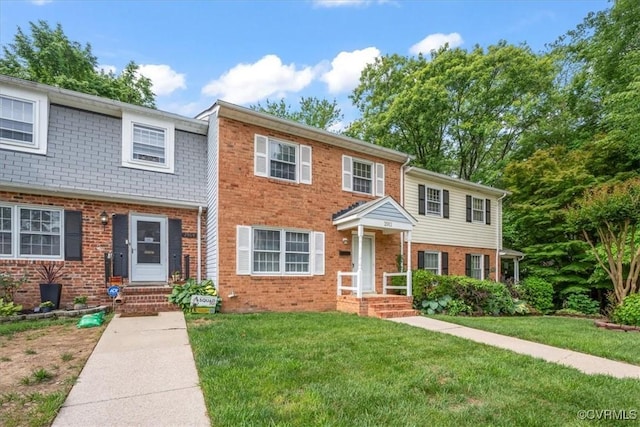 2911 Ennismore Ct, Chesterfield, VA 23224 - townhome / multi-family property featuring brick siding and a front lawn