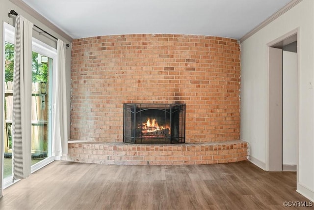 2911 Ennismore Ct, Chesterfield, VA 23224 - unfurnished living room with wood finished floors, a fireplace, and crown molding