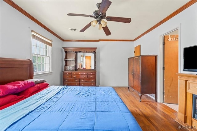 2911 Ennismore Ct, Chesterfield, VA 23224 - bedroom featuring wood finished floors, crown molding, and ceiling fan
