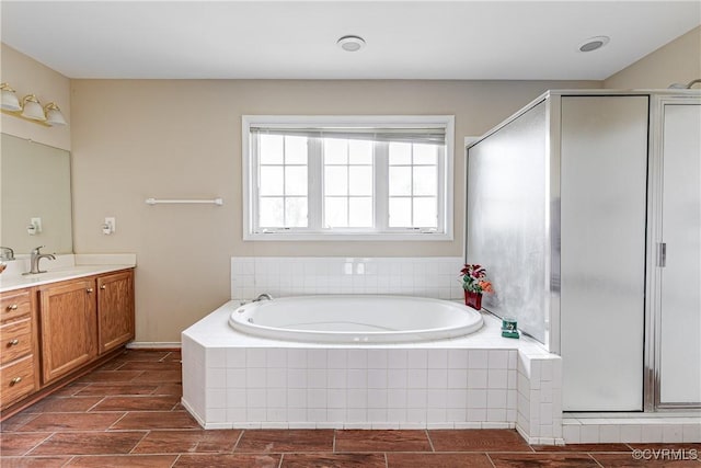 1408 Selma Ln, Henrico, VA 23223 - bathroom with vanity, a garden tub, and a shower stall