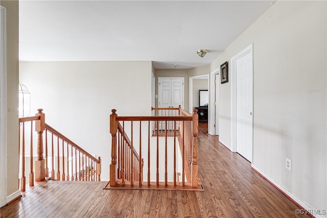 1408 Selma Ln, Henrico, VA 23223 - hall featuring an upstairs landing, wood finished floors, and baseboards