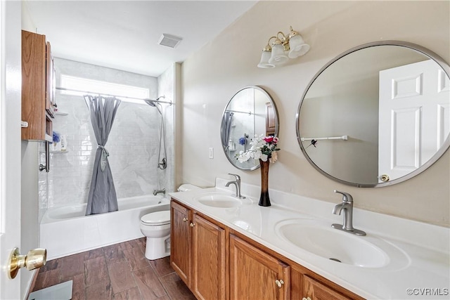 1408 Selma Ln, Henrico, VA 23223 - bathroom with shower / tub combo with curtain, toilet, double vanity, and wood finished floors