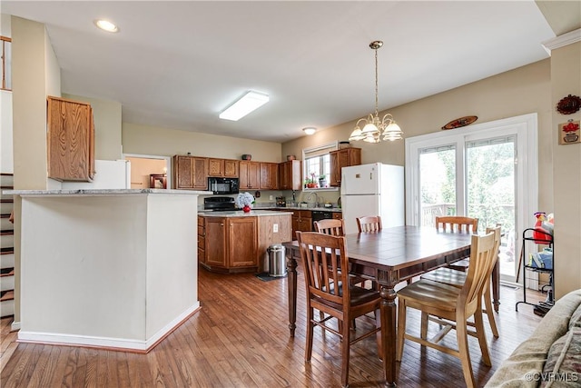 1408 Selma Ln, Henrico, VA 23223 - dining room with wood finished floors, a chandelier, and recessed lighting