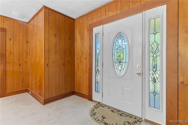 672 Main St, Dillwyn, VA 23936 - entryway with carpet, wood walls, and baseboards