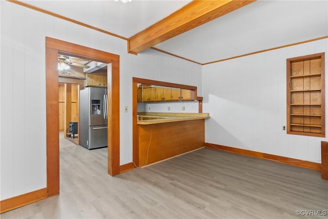 672 Main St, Dillwyn, VA 23936 - kitchen featuring stainless steel fridge with ice dispenser, light wood-style flooring, brown cabinets, crown molding, and baseboards
