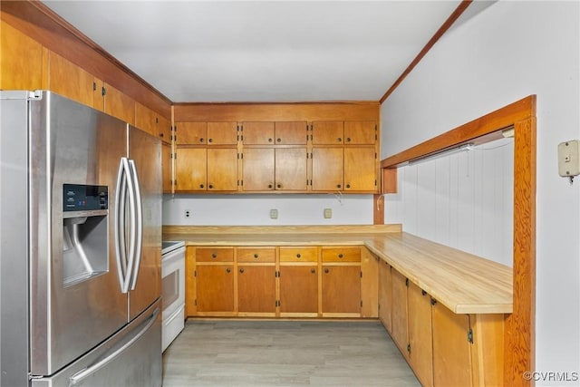 672 Main St, Dillwyn, VA 23936 - kitchen with stainless steel fridge with ice dispenser, white electric range oven, light countertops, light wood-type flooring, and brown cabinetry