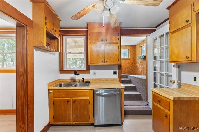 672 Main St, Dillwyn, VA 23936 - kitchen with dishwasher, a sink, a ceiling fan, light wood-type flooring, and light countertops