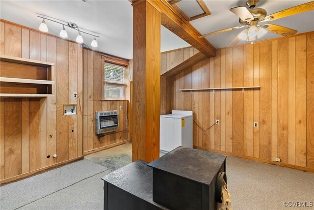 672 Main St, Dillwyn, VA 23936 - living area with wood walls, heating unit, carpet, a ceiling fan, and washer / clothes dryer