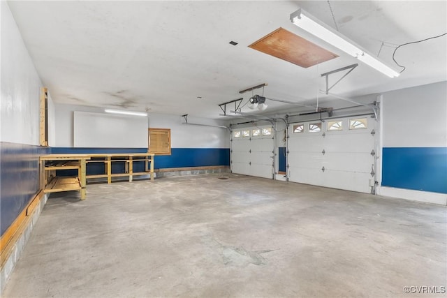 672 Main St, Dillwyn, VA 23936 - garage featuring a garage door opener