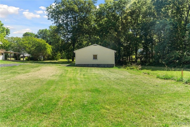672 Main St, Dillwyn, VA 23936 - view of green lawn with a carport
