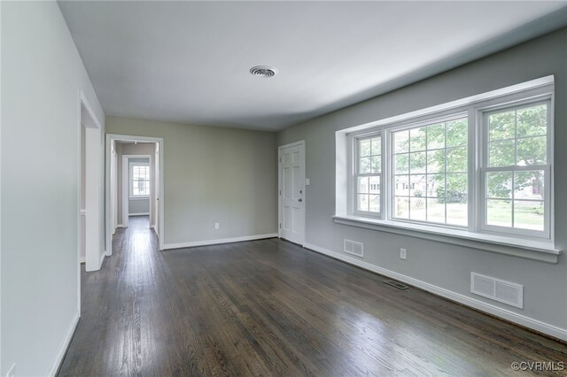 9019 Farmington Dr, Henrico, VA 23229 - unfurnished room with baseboards and dark wood-type flooring