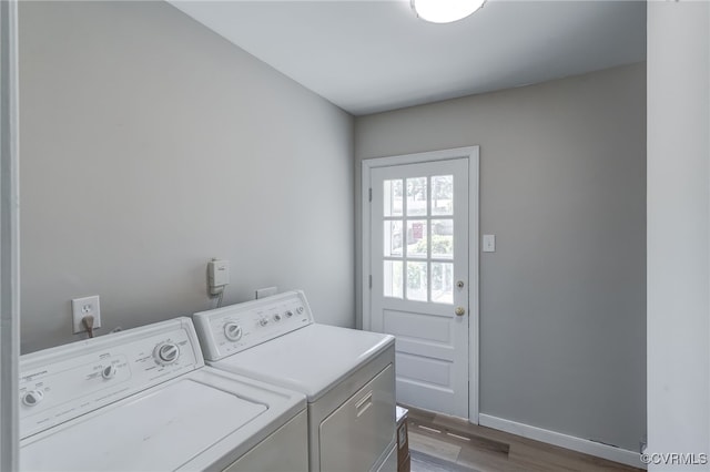 9019 Farmington Dr, Henrico, VA 23229 - washroom featuring washer and dryer, wood finished floors, and baseboards