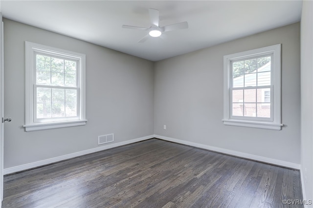 9019 Farmington Dr, Henrico, VA 23229 - unfurnished room with dark wood finished floors, plenty of natural light, baseboards, and ceiling fan