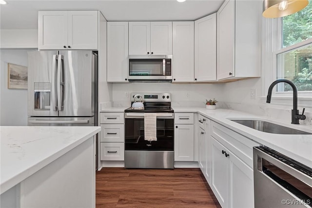 1307 Unison Dr, Chesterfield, VA 23113 - kitchen featuring appliances with stainless steel finishes, a sink, white cabinets, dark wood-style flooring, and recessed lighting