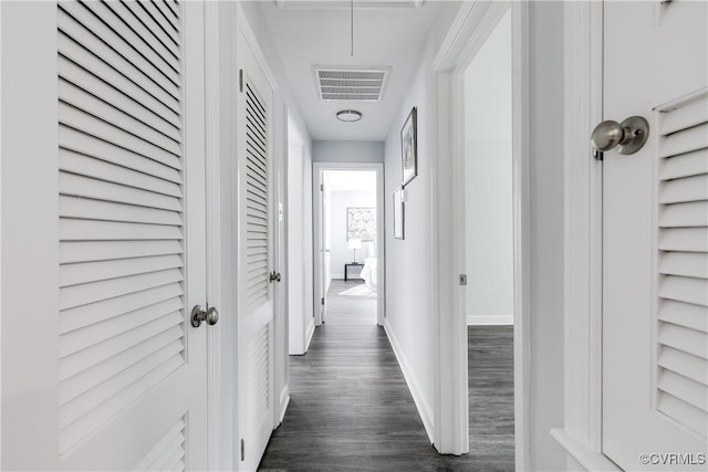 6256 Nicolet Rd, Richmond, VA 23225 - corridor with dark wood-style flooring, baseboards, and attic access
