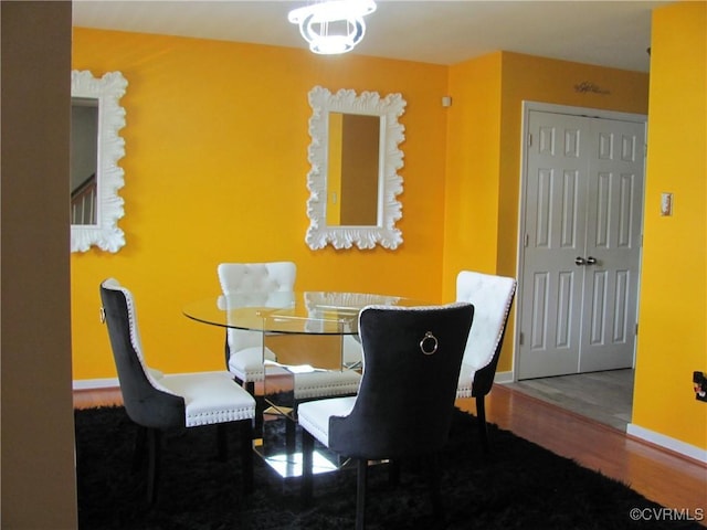 11506 Charles Towne Rd, Midlothian, VA 23112 - dining room with wood finished floors and baseboards