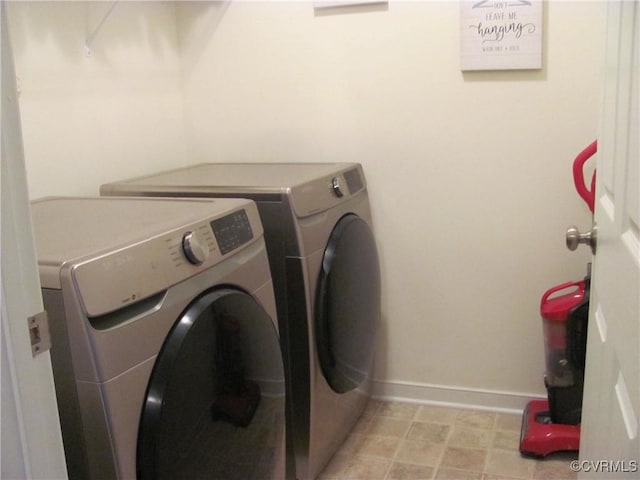 11506 Charles Towne Rd, Midlothian, VA 23112 - laundry area featuring separate washer and dryer and baseboards