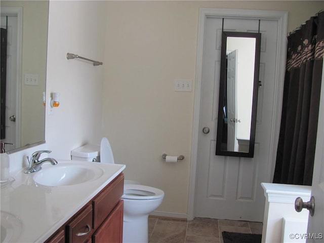 11506 Charles Towne Rd, Midlothian, VA 23112 - full bath featuring toilet, double vanity, and baseboards