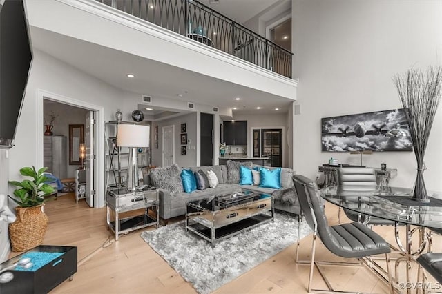 4820 Old Main St Unit 604, Henrico, VA 23231 - living area with wood finished floors and a high ceiling