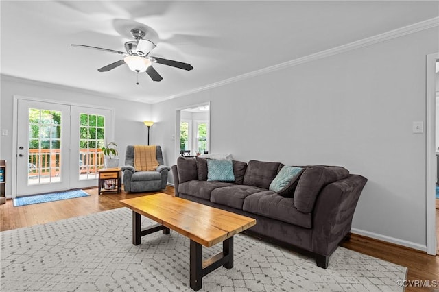 10112 Huntersdell Ln, Chesterfield, VA 23235 - living area featuring plenty of natural light, ceiling fan, light wood-style flooring, crown molding, and baseboards
