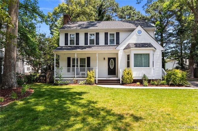 10112 Huntersdell Ln, Chesterfield, VA 23235 - view of front facade featuring a porch, a chimney, and a front yard
