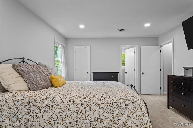10112 Huntersdell Ln, Chesterfield, VA 23235 - bedroom with multiple windows, light carpet, and recessed lighting