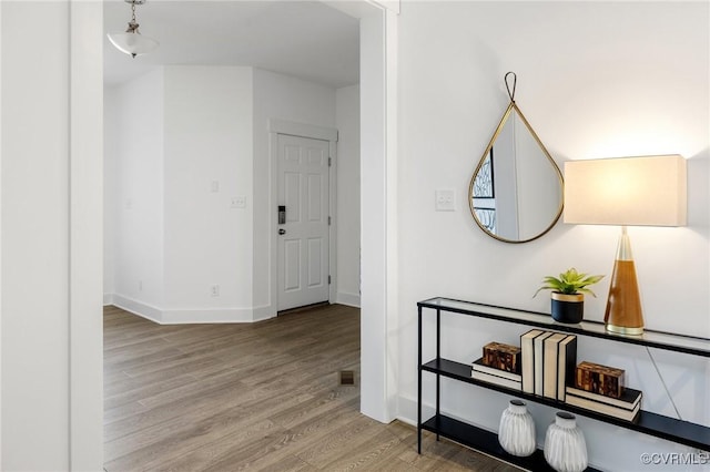 11183 Pinewild Dr, Providence Forge, VA 23140 - corridor with wood finished floors and baseboards