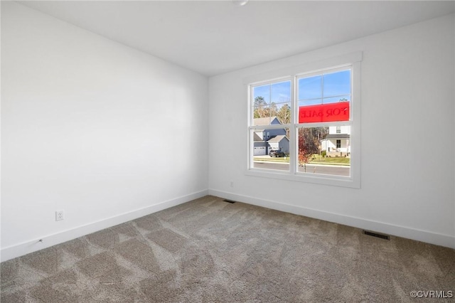 11183 Pinewild Dr, Providence Forge, VA 23140 - spare room with carpet flooring and baseboards