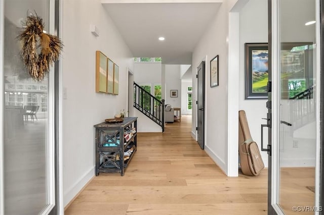 333 Pond View Ln, Goochland, VA 23103 - corridor with light wood-style flooring, stairway, and recessed lighting