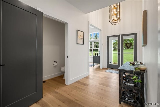 333 Pond View Ln, Goochland, VA 23103 - foyer featuring light wood-style floors and a chandelier