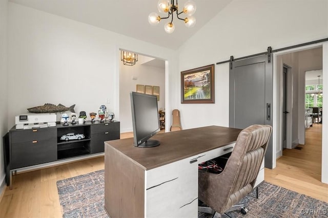 333 Pond View Ln, Goochland, VA 23103 - office with a chandelier, light wood-style flooring, vaulted ceiling, and a barn door