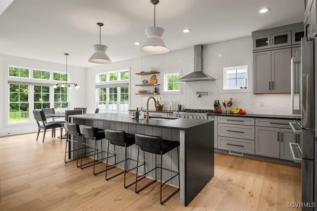333 Pond View Ln, Goochland, VA 23103 - kitchen featuring wall chimney exhaust hood, backsplash, plenty of natural light, gray cabinets, and recessed lighting
