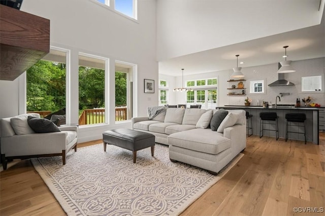 333 Pond View Ln, Goochland, VA 23103 - living room with light wood-style flooring and a high ceiling