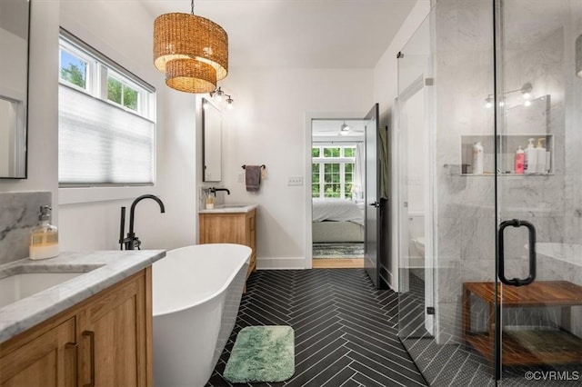 333 Pond View Ln, Goochland, VA 23103 - ensuite bathroom featuring two vanities, a freestanding bath, and a shower stall