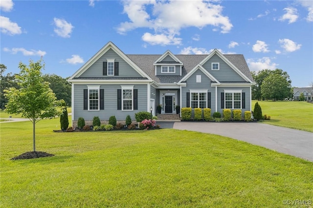 3381 Holywell Cir, Powhatan, VA 23139 - view of front facade featuring a front lawn, driveway, and a shingled roof