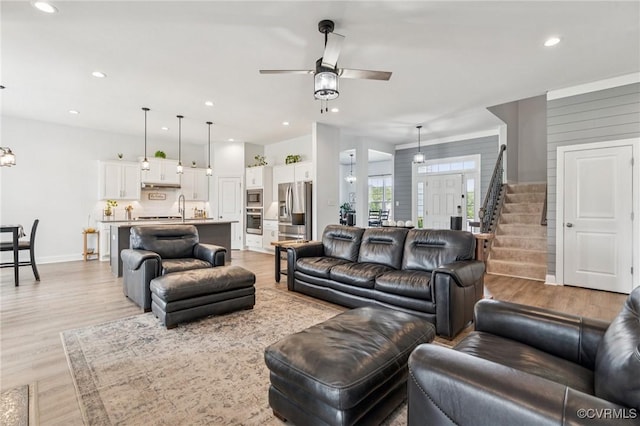 3381 Holywell Cir, Powhatan, VA 23139 - living area featuring a ceiling fan, light wood-style floors, stairs, recessed lighting, and baseboards