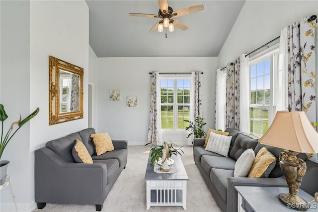 3381 Holywell Cir, Powhatan, VA 23139 - living area featuring lofted ceiling, plenty of natural light, baseboards, ceiling fan, and light colored carpet
