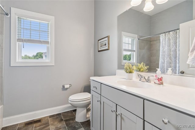 3381 Holywell Cir, Powhatan, VA 23139 - bathroom with vanity, baseboards, toilet, and curtained shower