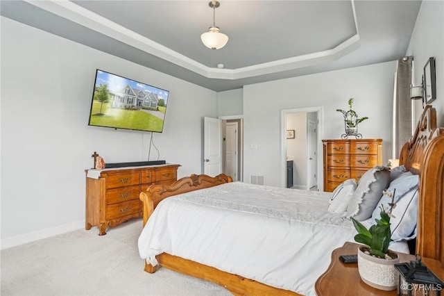 3381 Holywell Cir, Powhatan, VA 23139 - bedroom featuring light carpet, a raised ceiling, baseboards, and ensuite bath