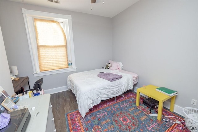 1701 W Leigh St, Richmond, VA 23220 - bedroom featuring wood finished floors, baseboards, and ceiling fan