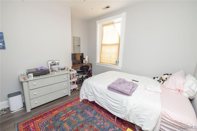 1701 W Leigh St, Richmond, VA 23220 - bedroom with wood finished floors and baseboards