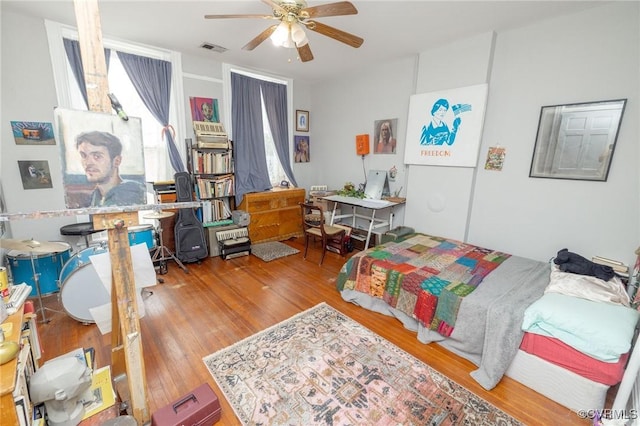 1701 W Leigh St, Richmond, VA 23220 - bedroom with wood finished floors and ceiling fan