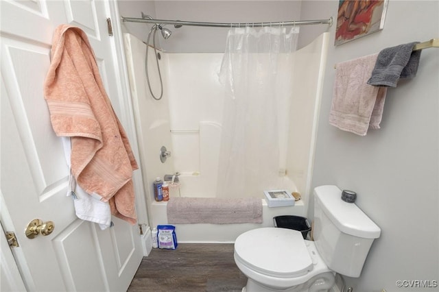 1701 W Leigh St, Richmond, VA 23220 - bathroom featuring toilet, wood finished floors, shower / tub combo with curtain, and baseboards